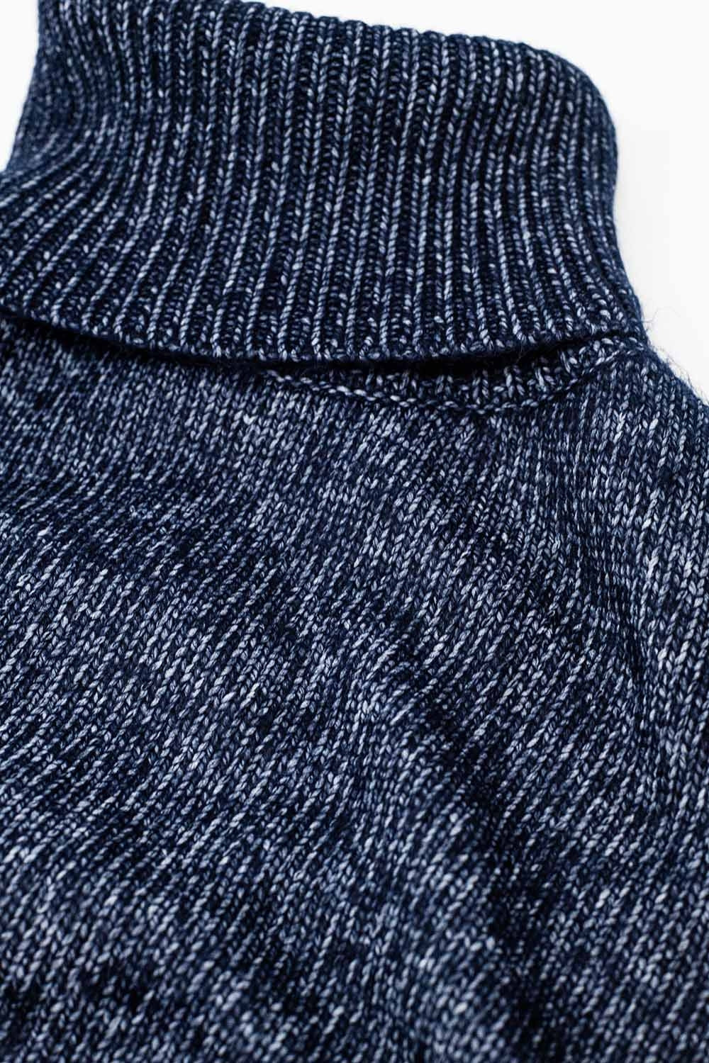 Blue turtleneck jumper with dropped sleeves