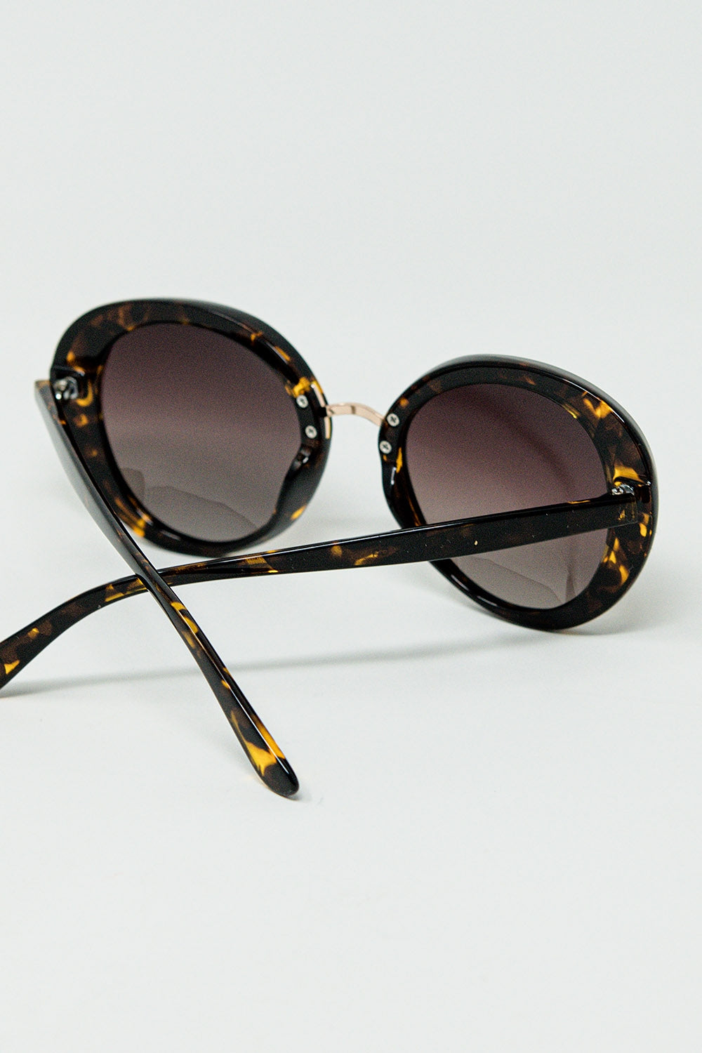 Bruine zonsondergangvlek ovale zonnebril