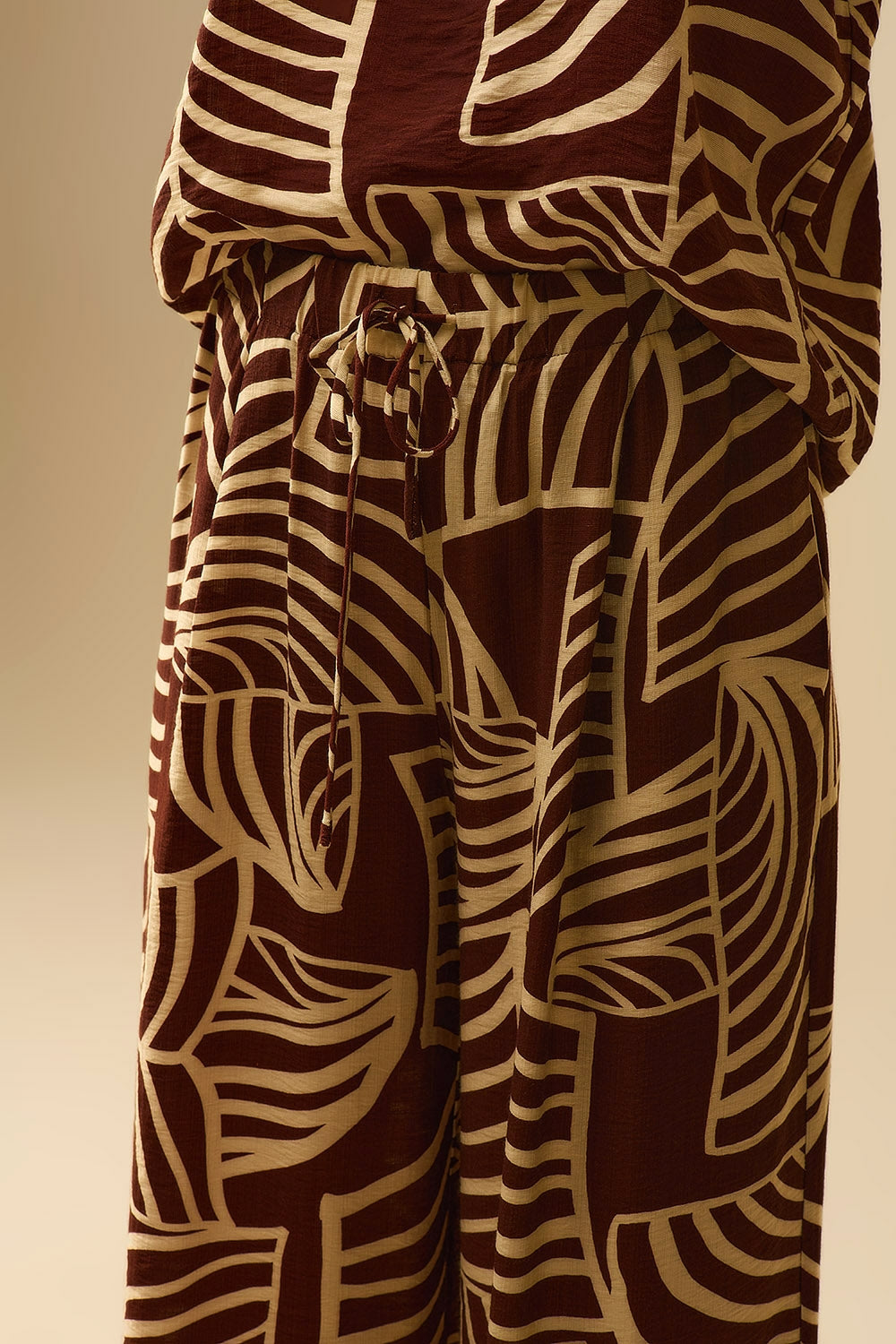 Brown Wide Leg Trousers with White Leaf Print
