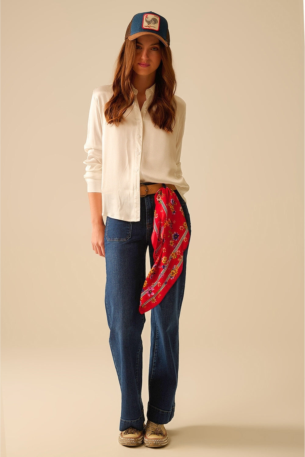 Dark wash jeans with wide leg and pockets