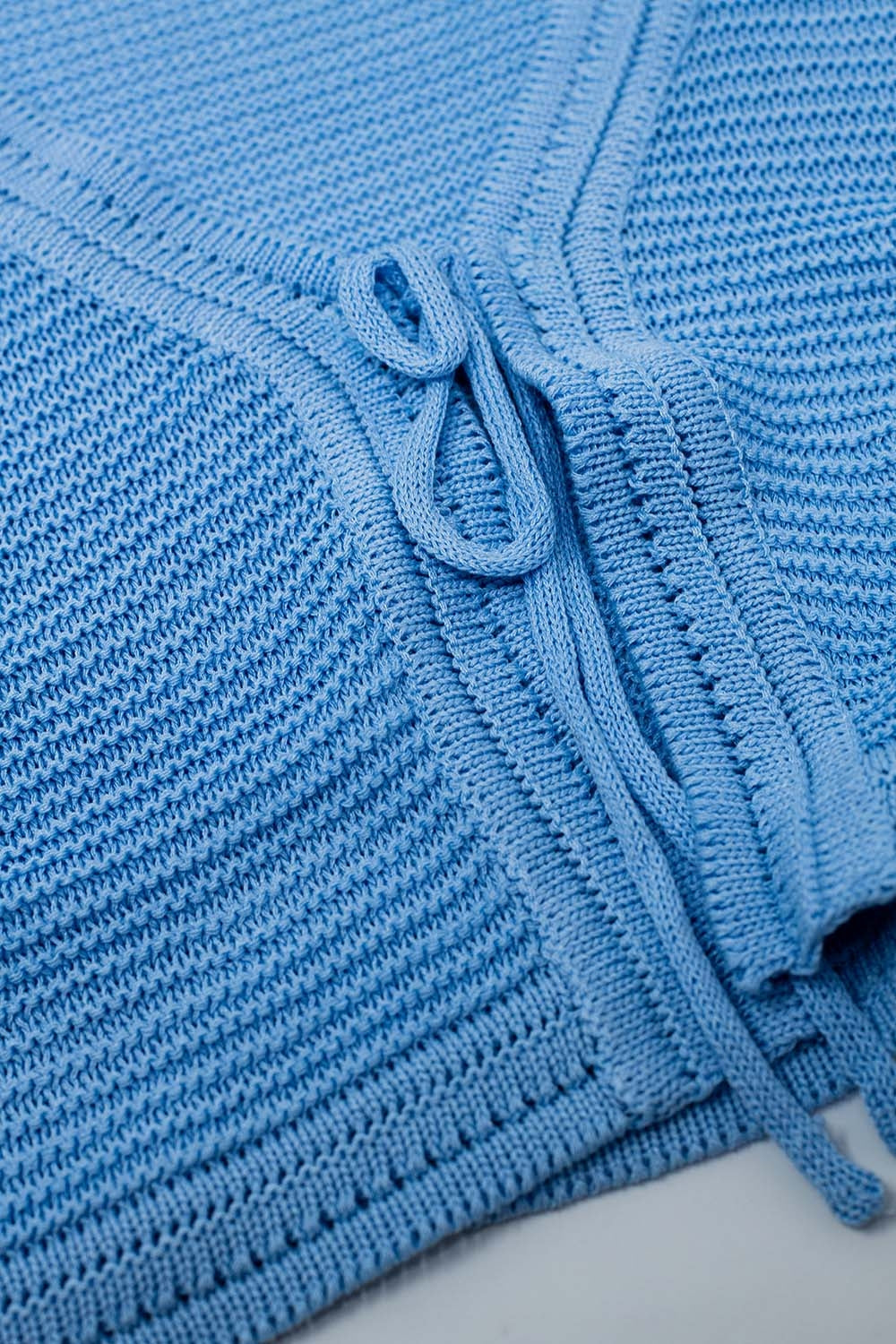 Cardigan de malha com manga comprida azul sino com detalhe de nó