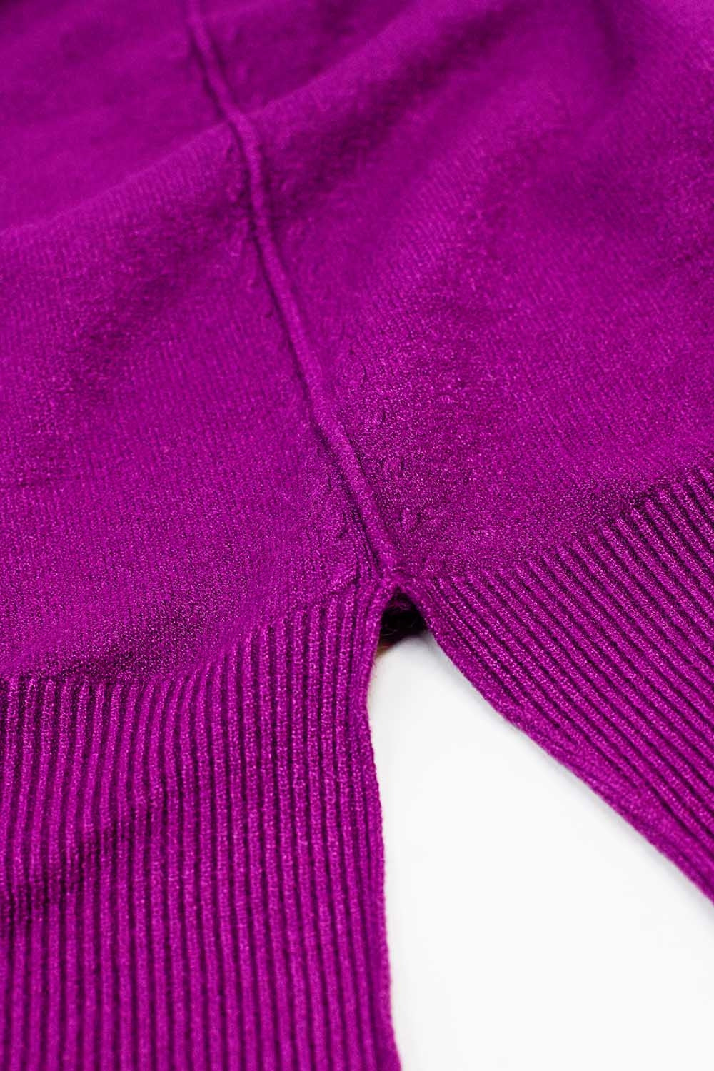 Losse fuchsia trui met open rugdetail