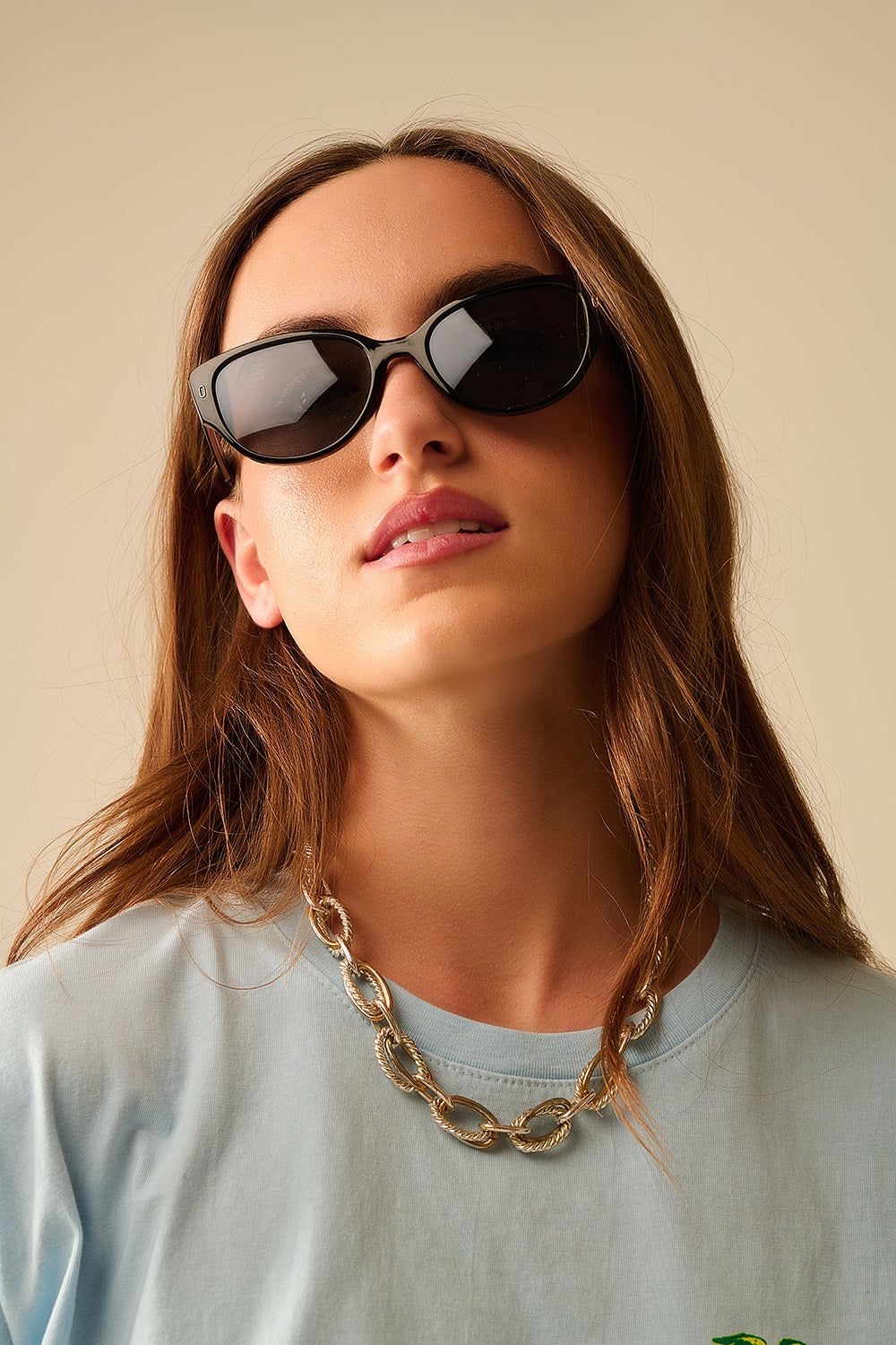 Ovale zonnebril met zwart montuur