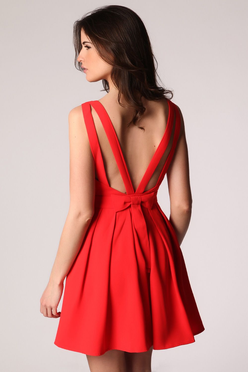 Red midi dress with open strap back and bow detail