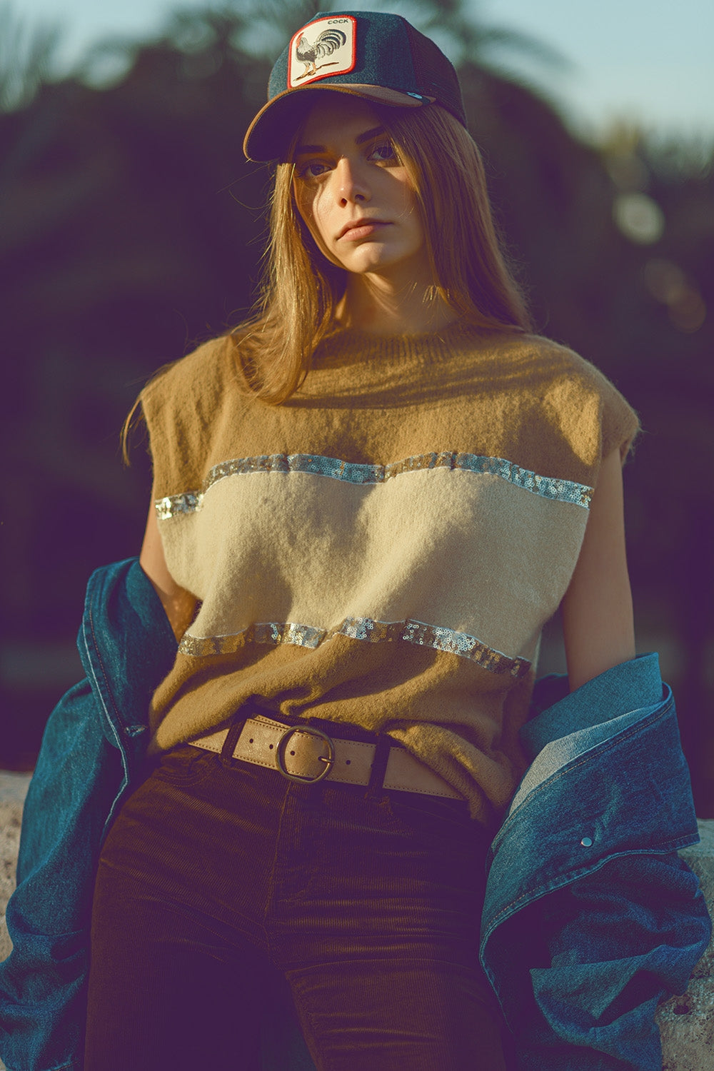 Sleeveless beige sweater with sequin detail