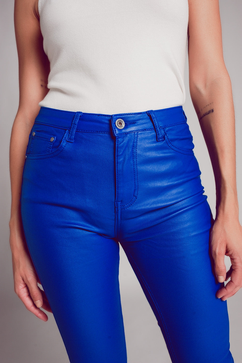 Stretch faux leather flare pants in blue
