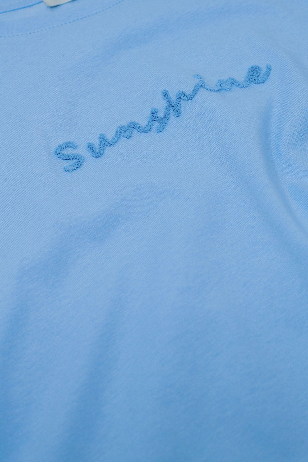 Sunshine oversized T-shirt with textured text at the front in blue