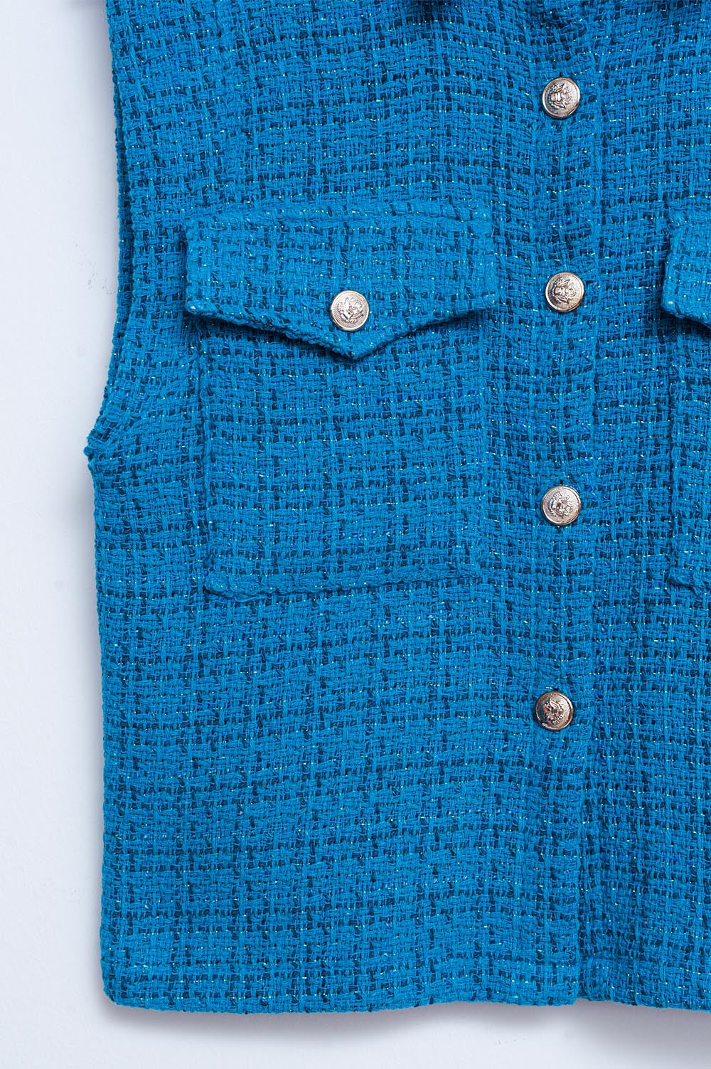 Maatpakvest in blauwe bouclé