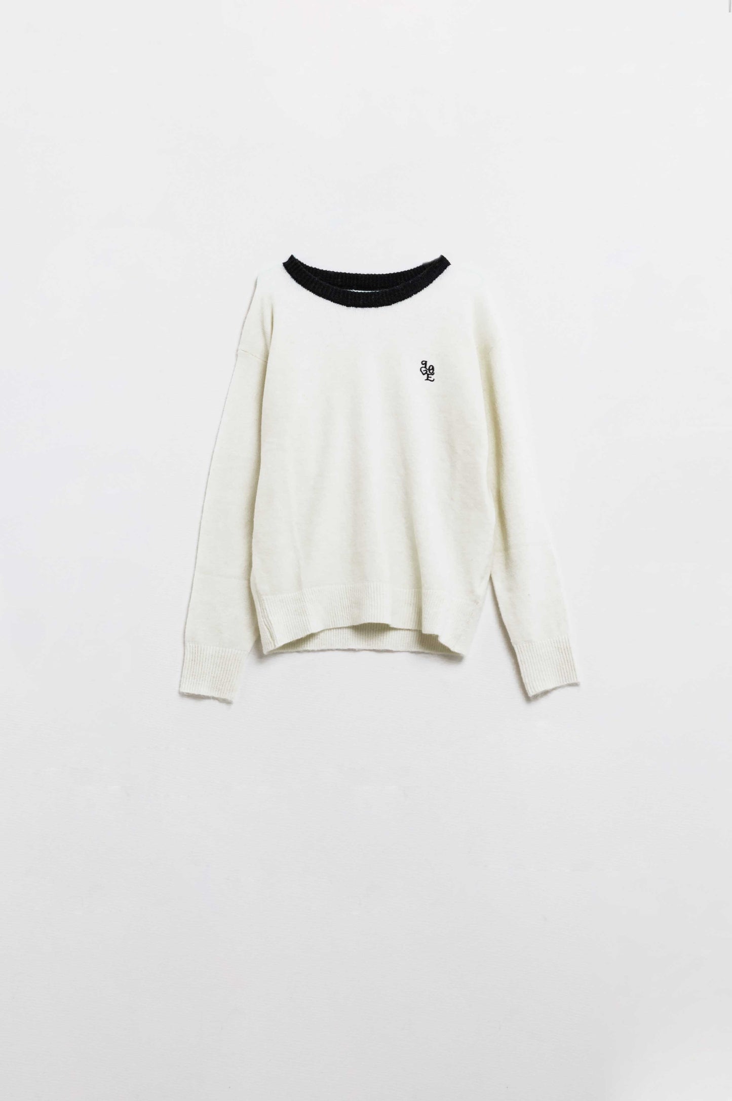 White sweater with contrasting collar and love logo on chest