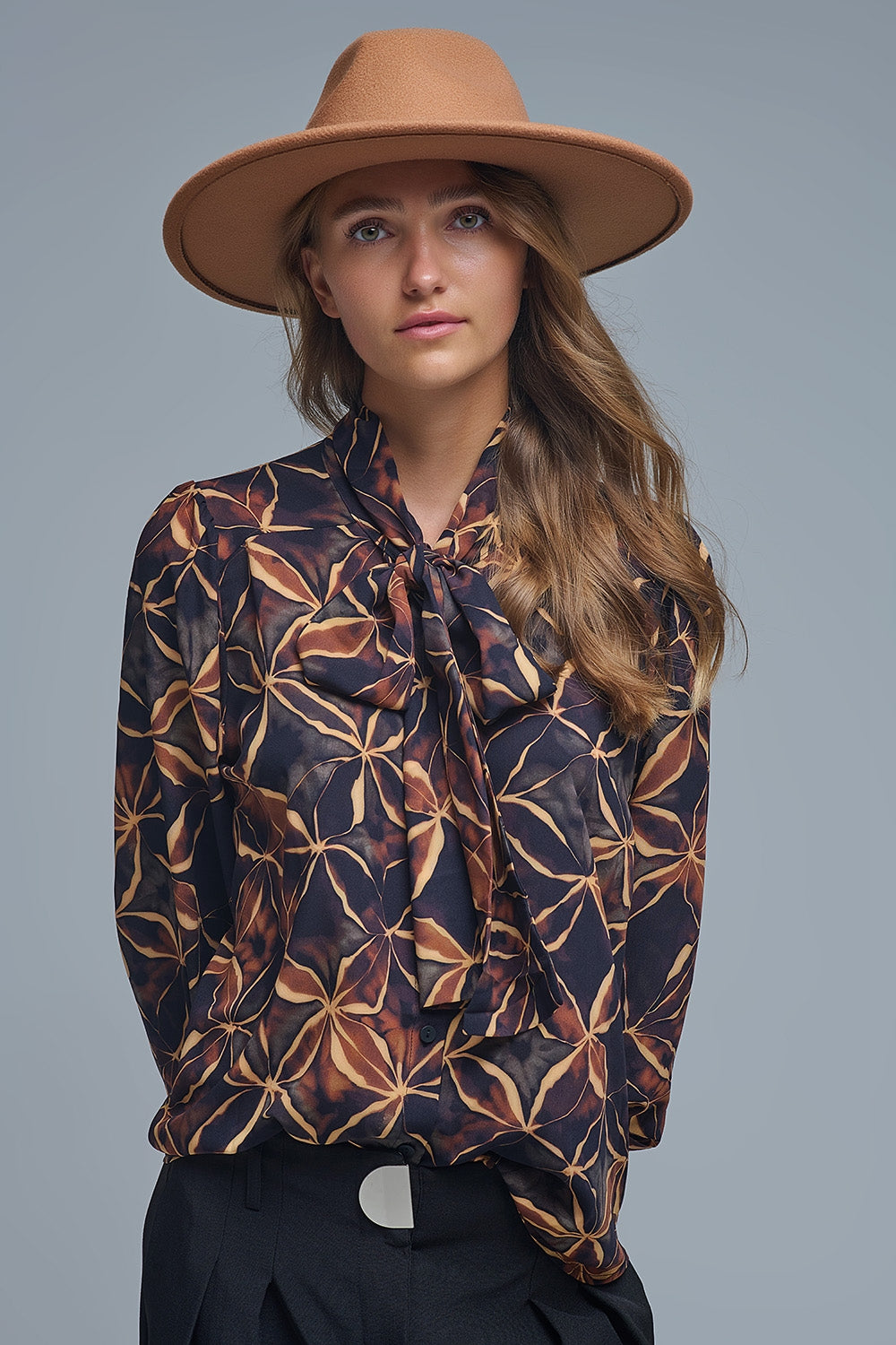 Q2 Black chiffon shirt with abstract print and knotted bow