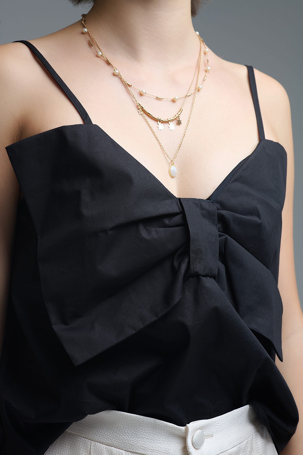 Black poplin crop top with bow detail
