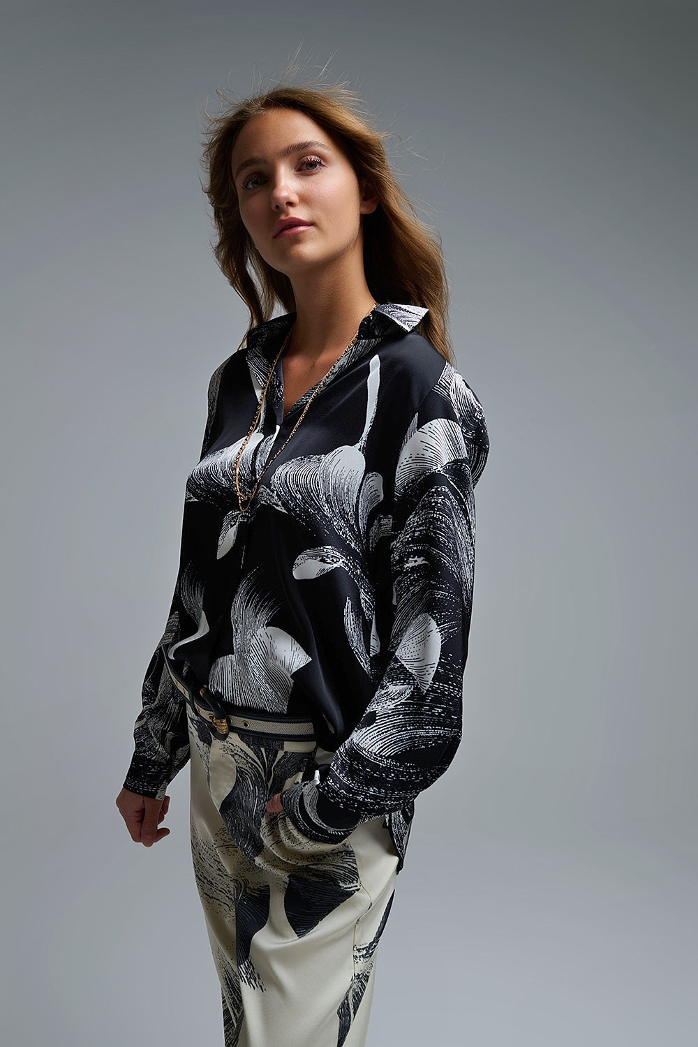 Q2 Black Satin blouse in abstract print