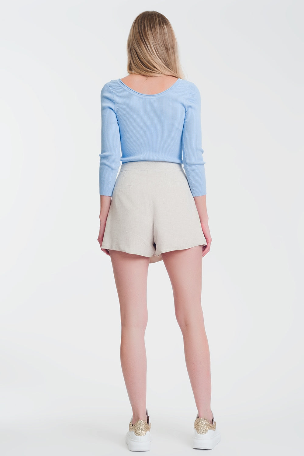 Blauwe gebreide trui met wijde hals