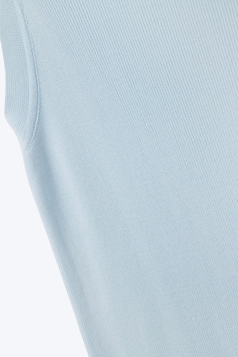 Comfortabele geribbelde top met boothals in babyblauw