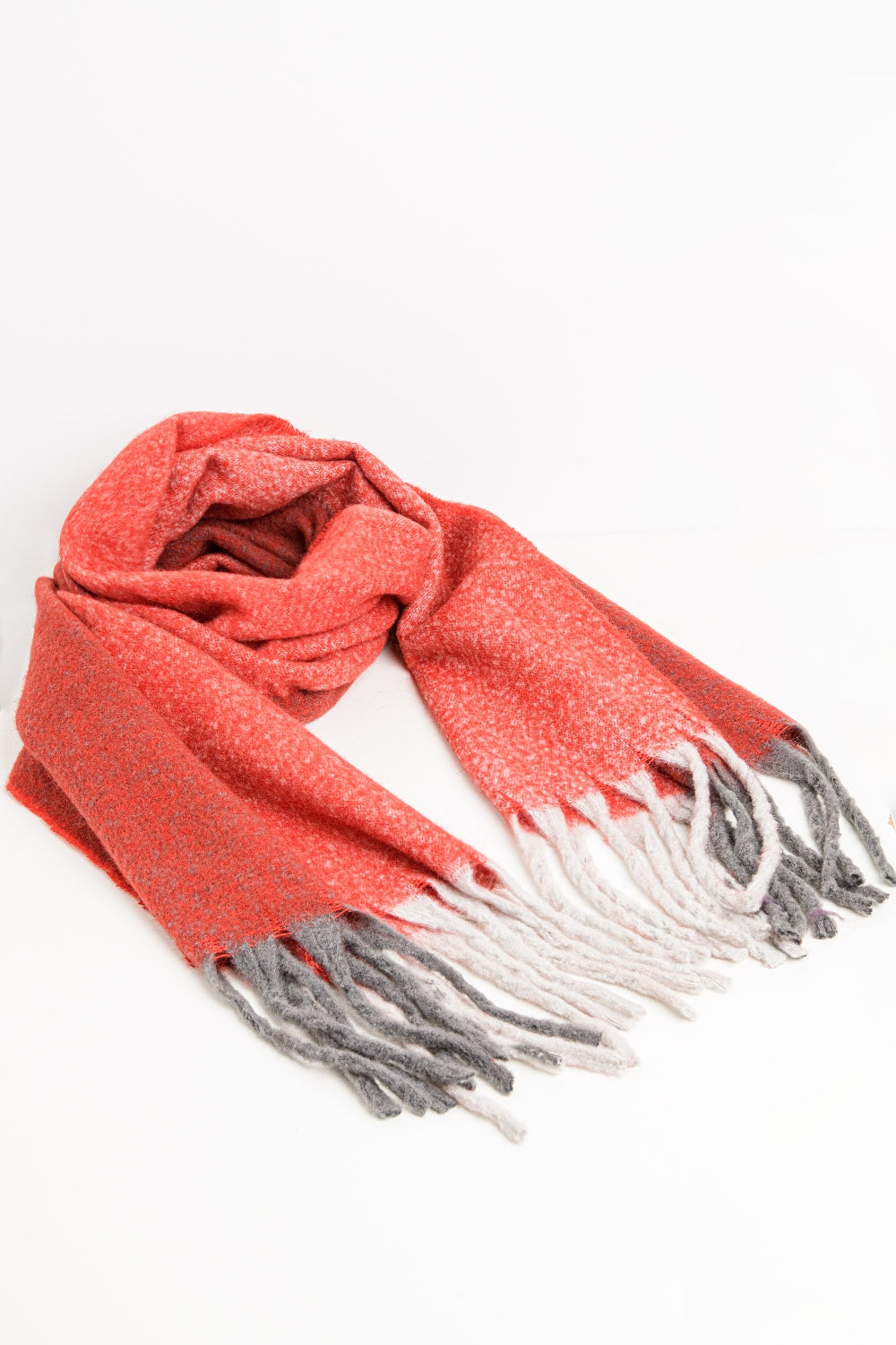 Chunky knit scarf in red color block with fringes