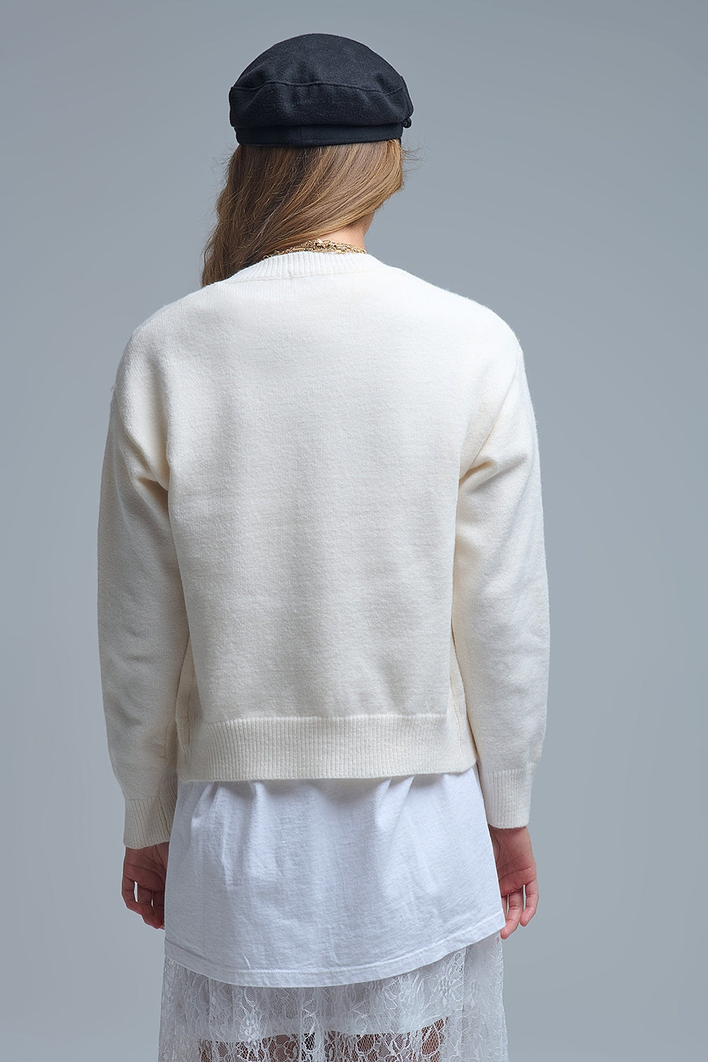 Gezellig wit vestje met rode hartjes