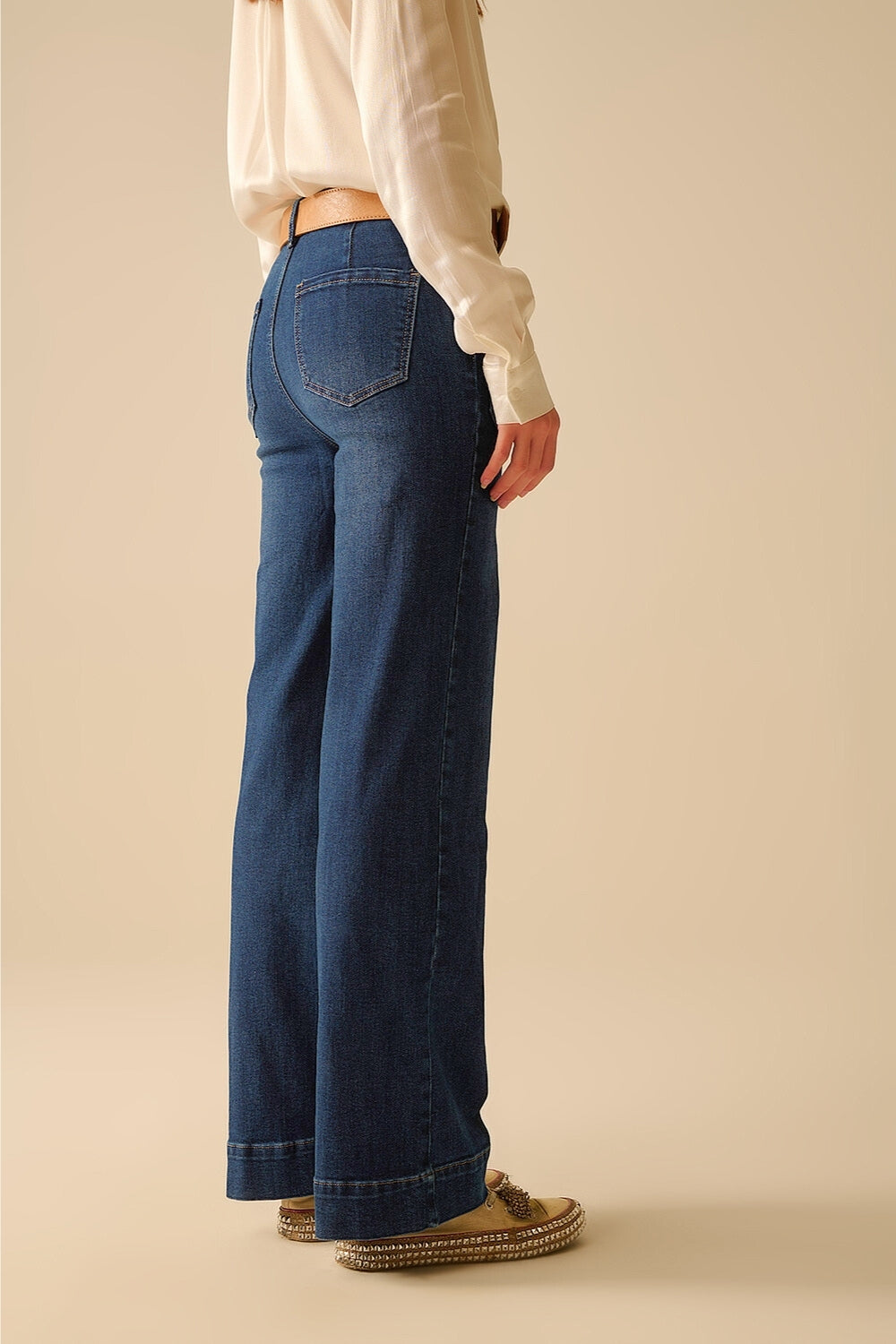 Dark wash jeans with wide leg and pockets