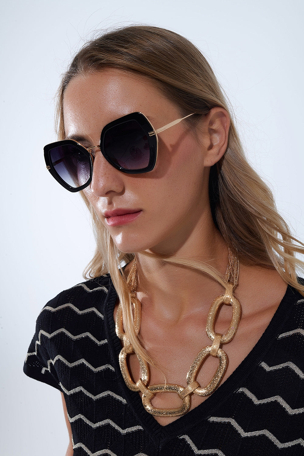 Extra grote zeshoekige cat eye zonnebril in zwart