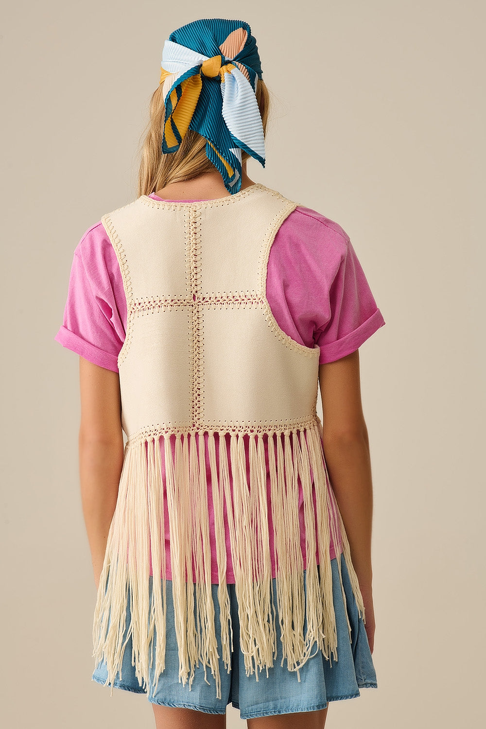 Faux leather vest with patchwork and fringe detail