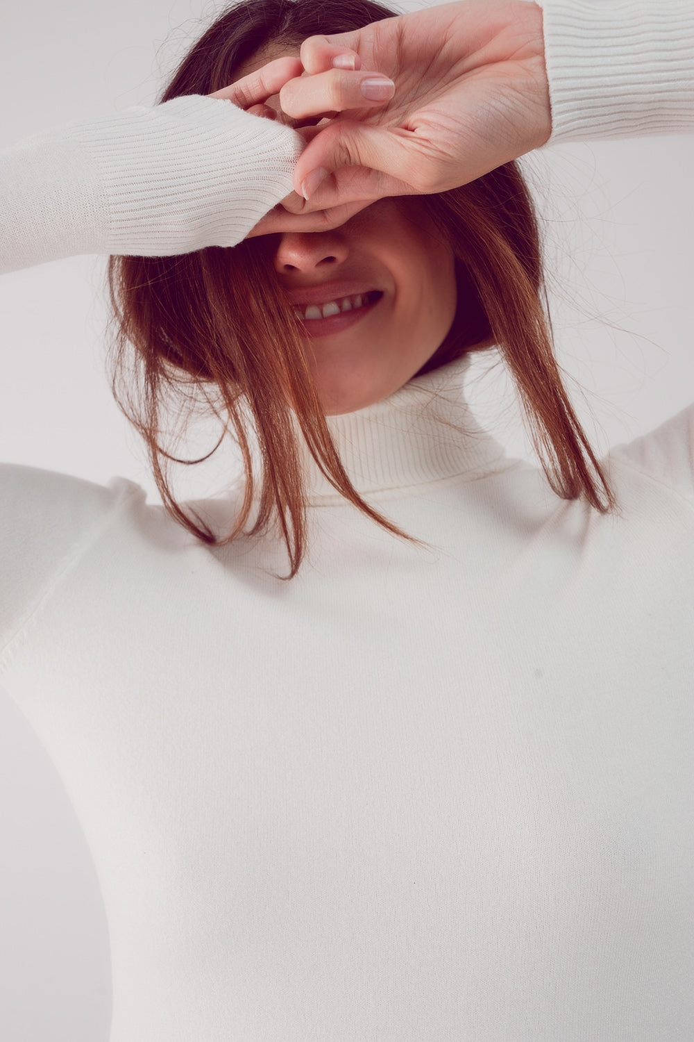 Fine knit high neck jumper in cream