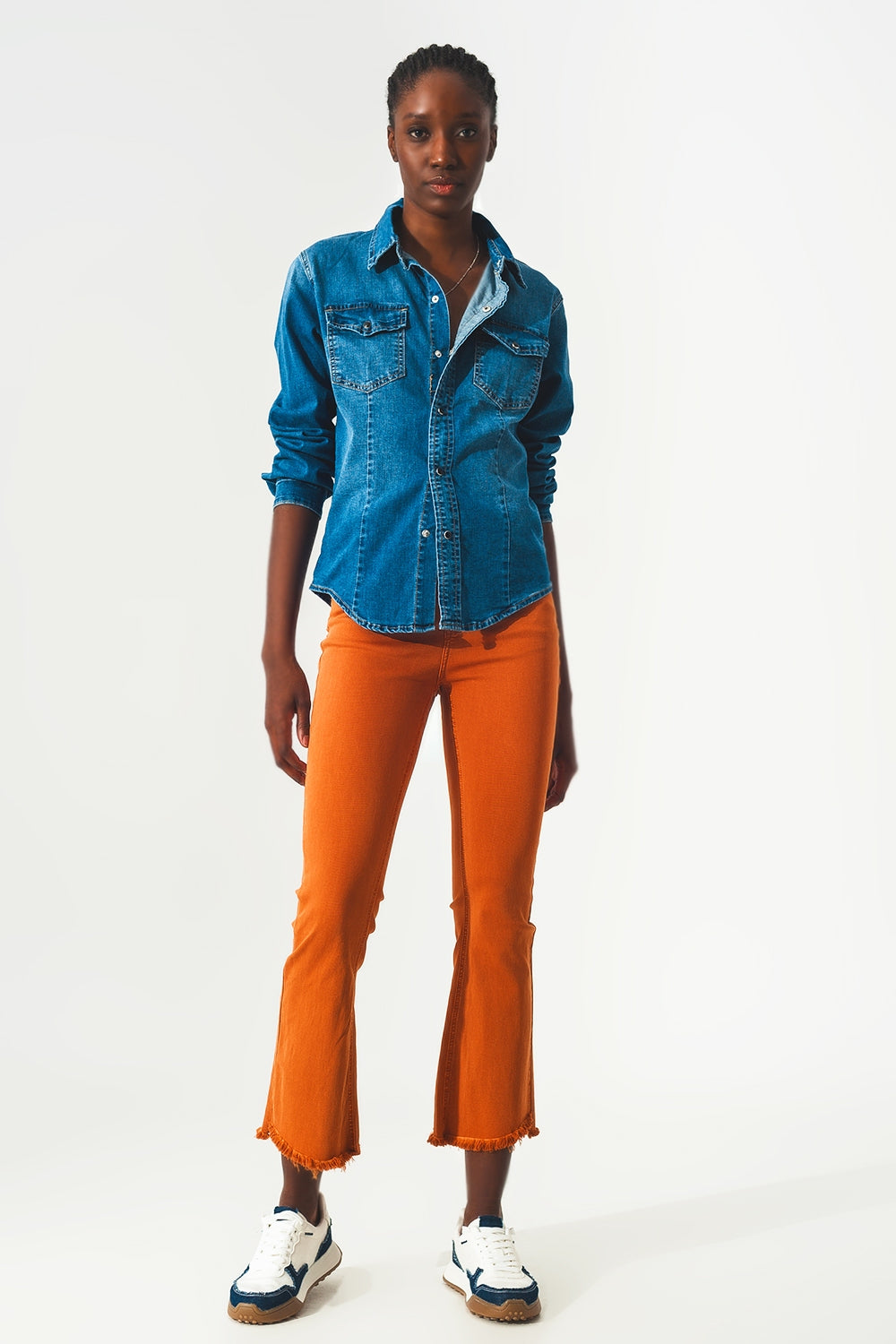 Flare jeans with raw hem edge in orange