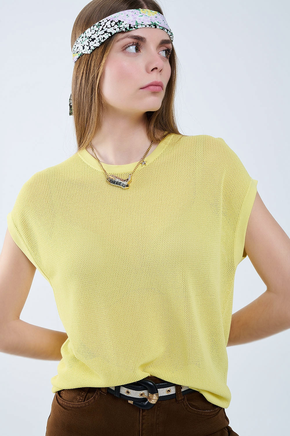 grid knit sweater in yellow color