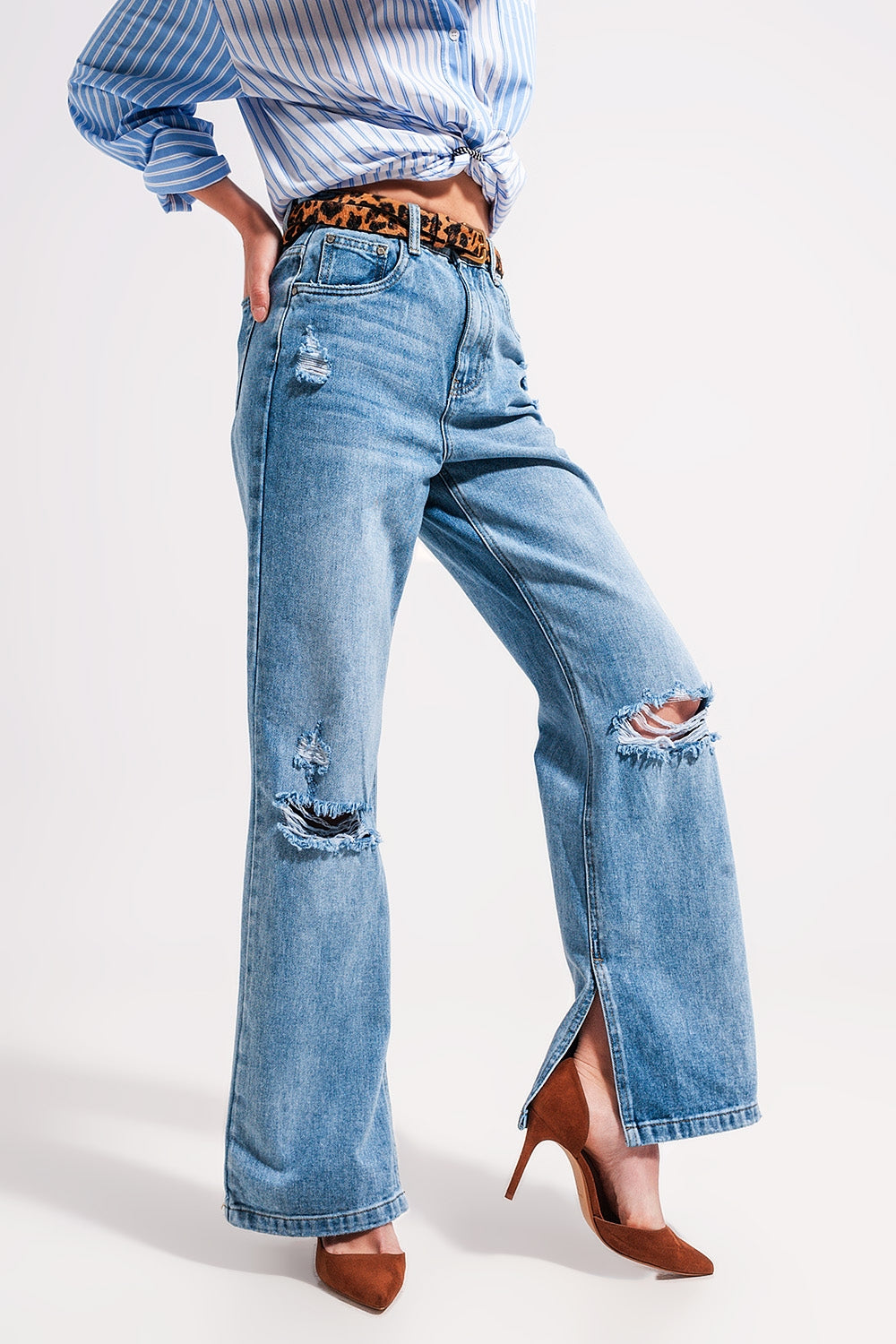 High waist jeans with split hem in vintage wash