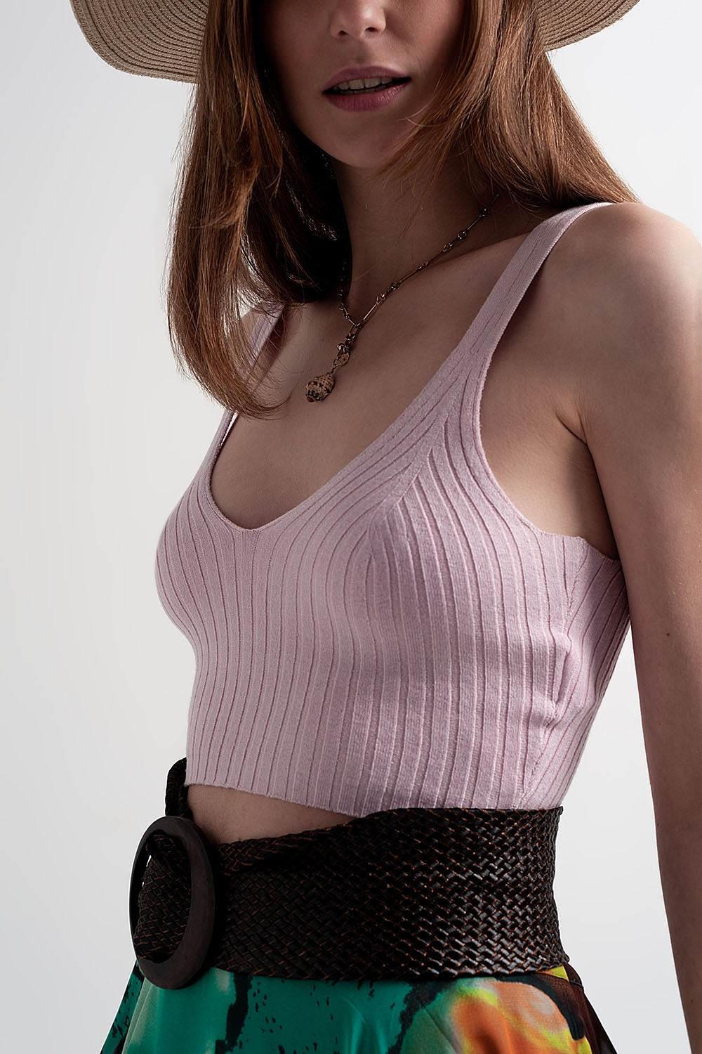 Top curto de malha coordenado em rosa