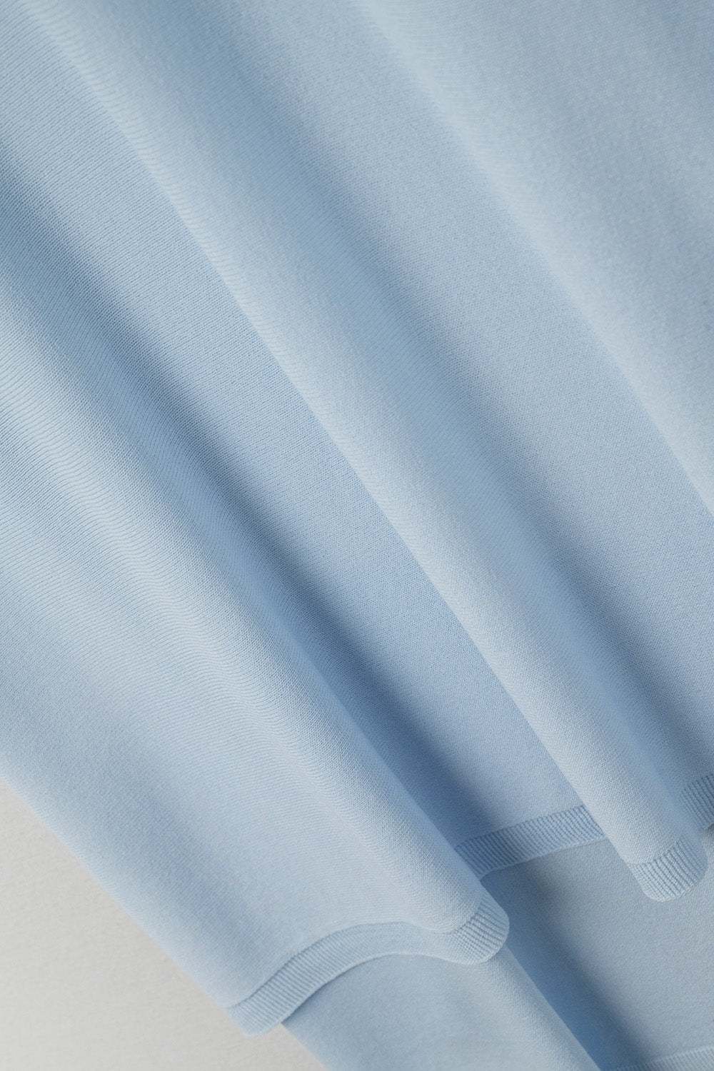 Lichtblauwe oversized trui met mouwen tot aan de elleboog