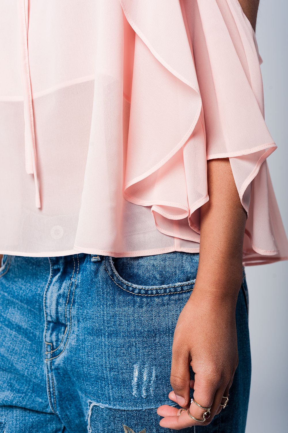 Lichtroze top met blote schouders