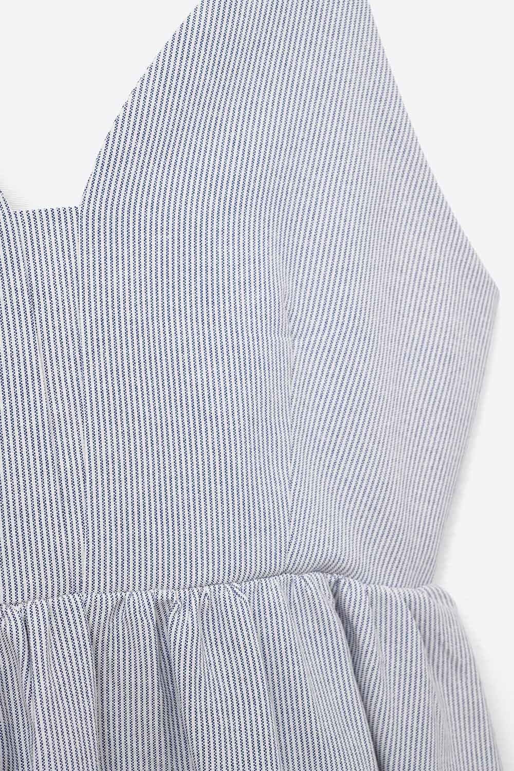 long blue striped dress with straps and crisscrossed back straps