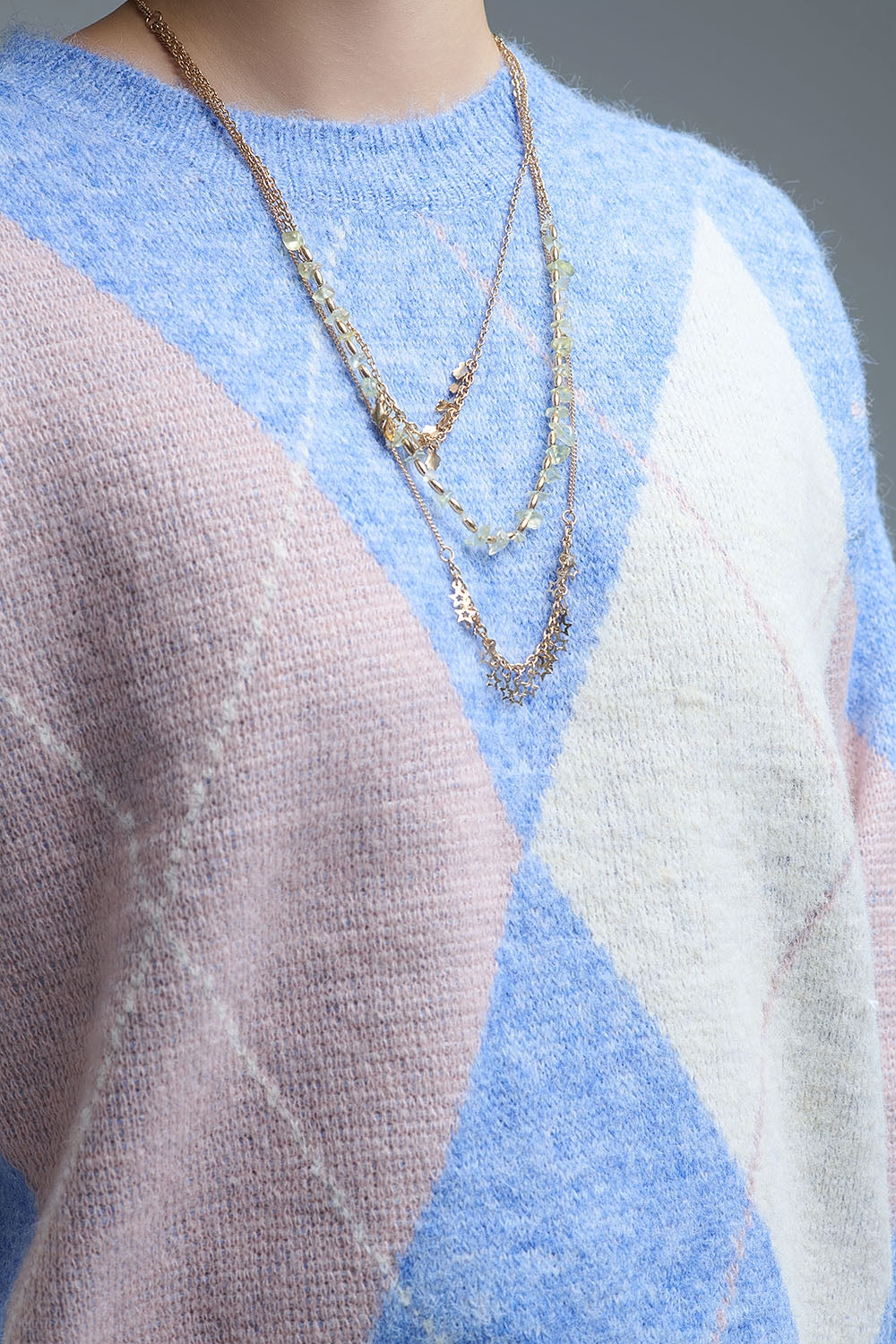 loose sweater in sky blue with diamond patterns