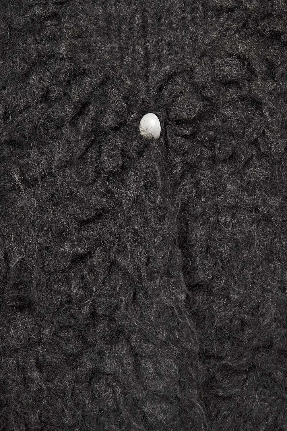 Luxe vest met zwarte langharige textuur