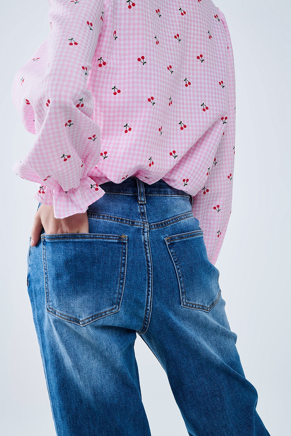 medium wash straight fit on cuffed hem jeans