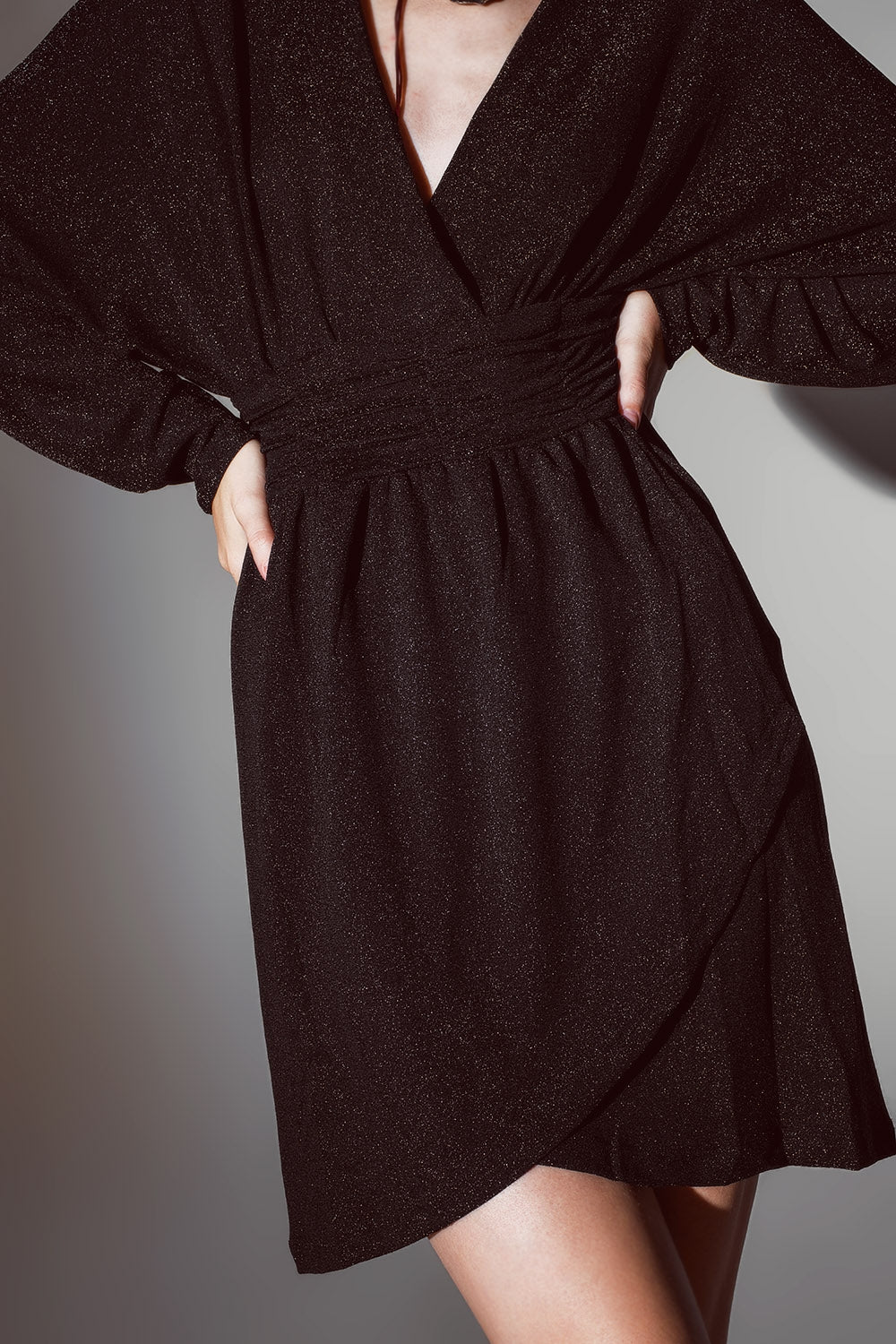 Mini-length glitter dress with deep V-neck in Black