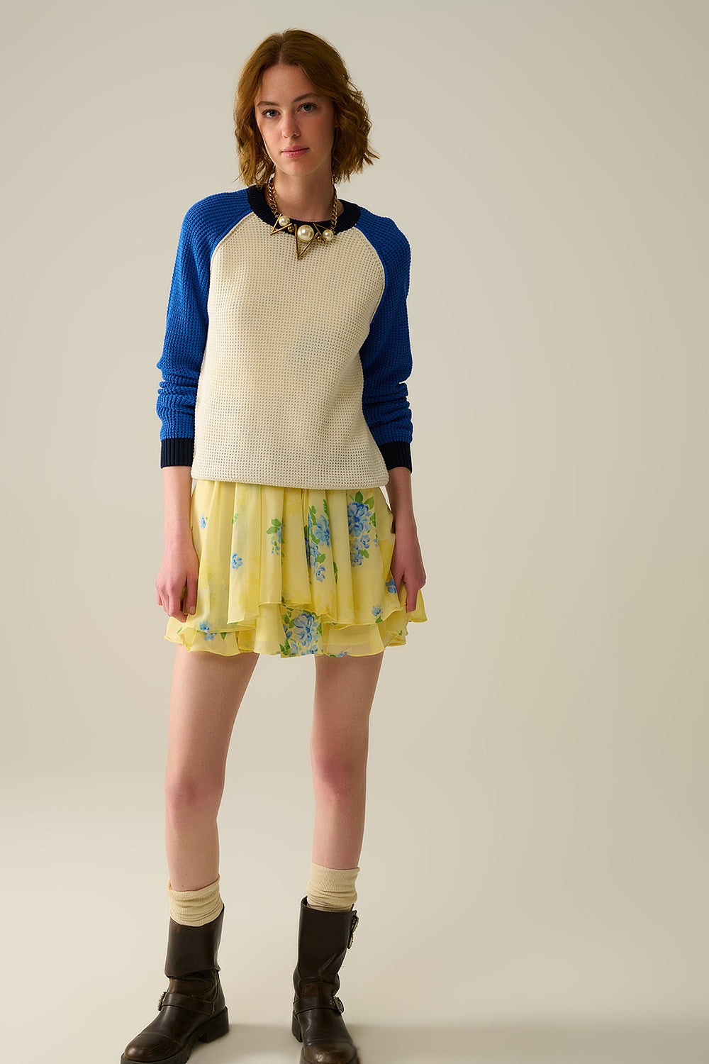 mossteek gebreide trui met contrasterende mouwen in blauw