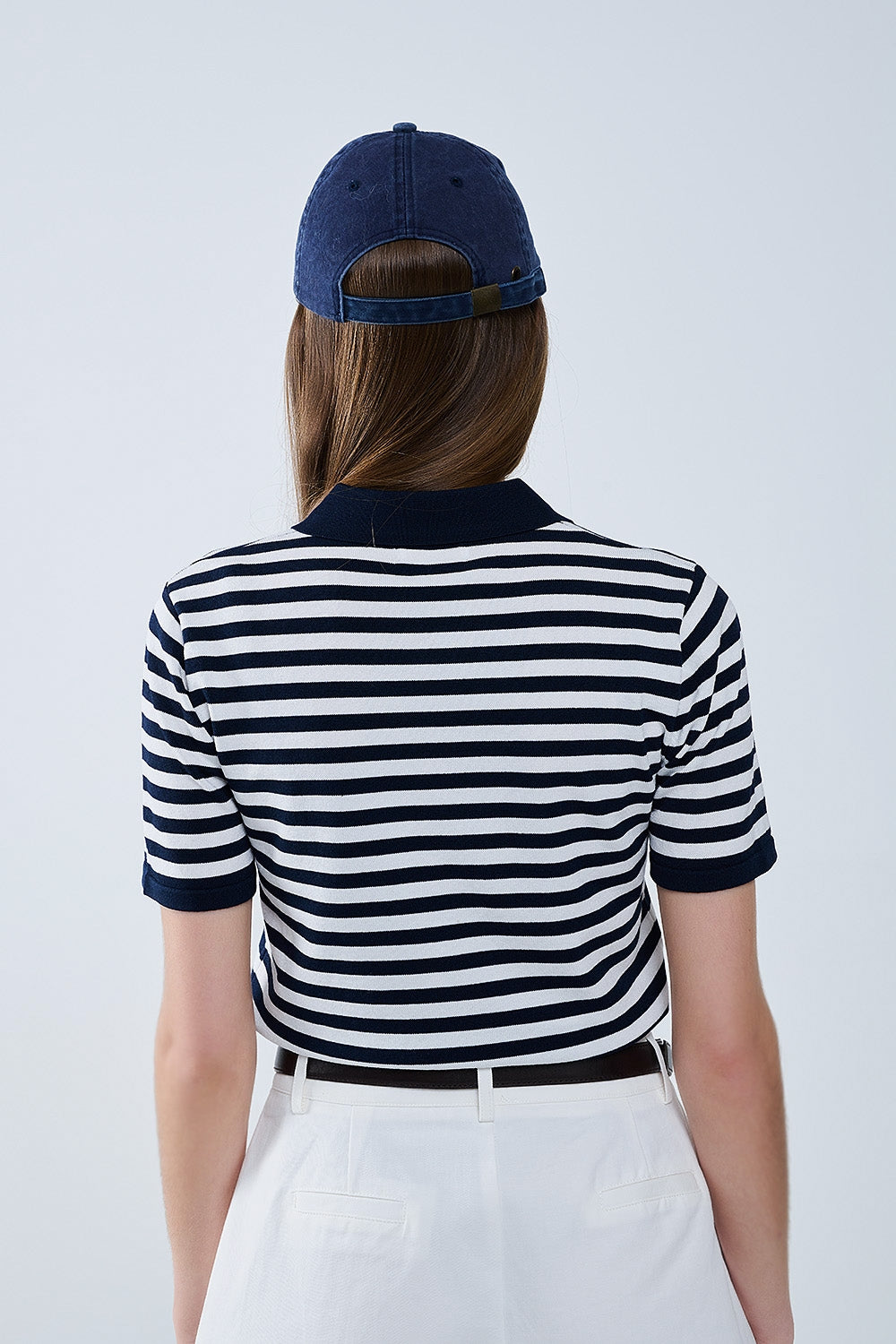 marineblauw en wit gestreept gebreid poloshirt