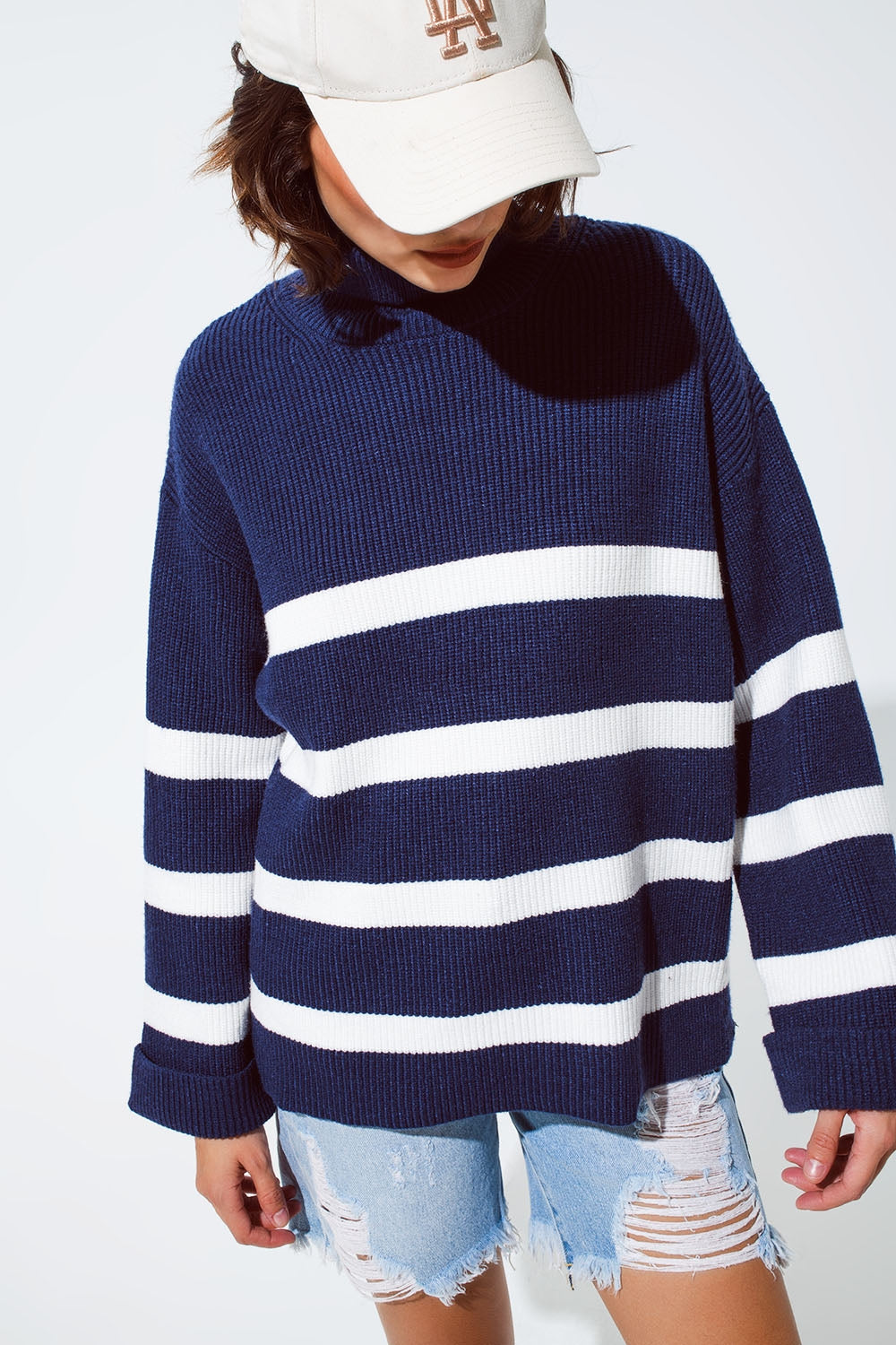 Navy blue turtle neck sweater in navy with stripes