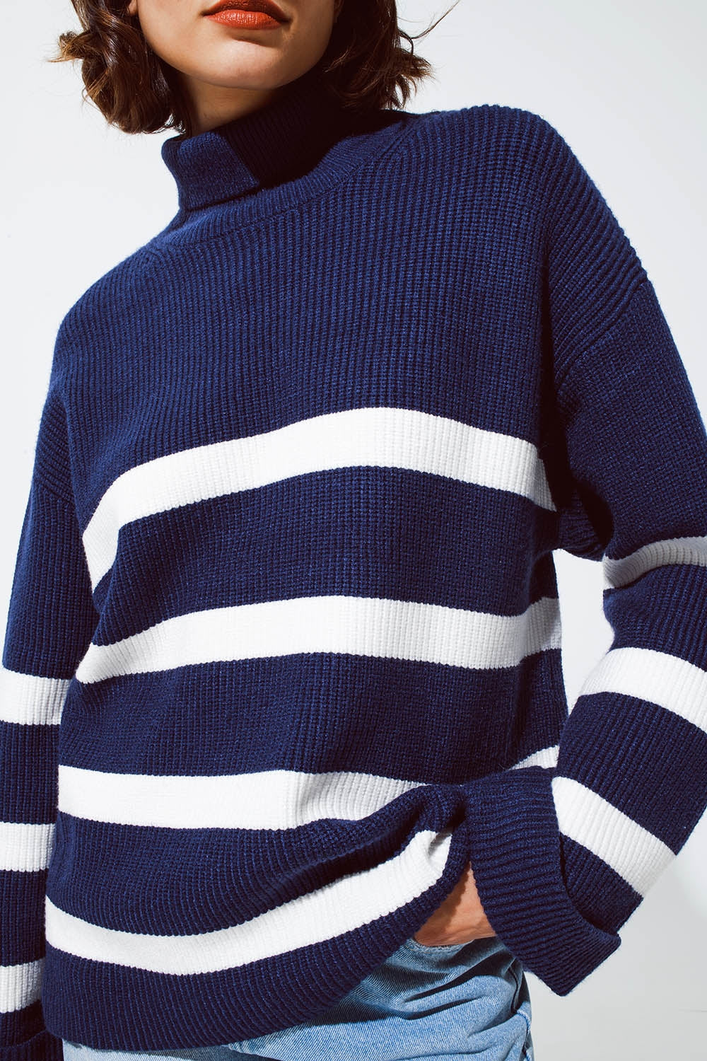 Navy blue turtle neck sweater in navy with stripes