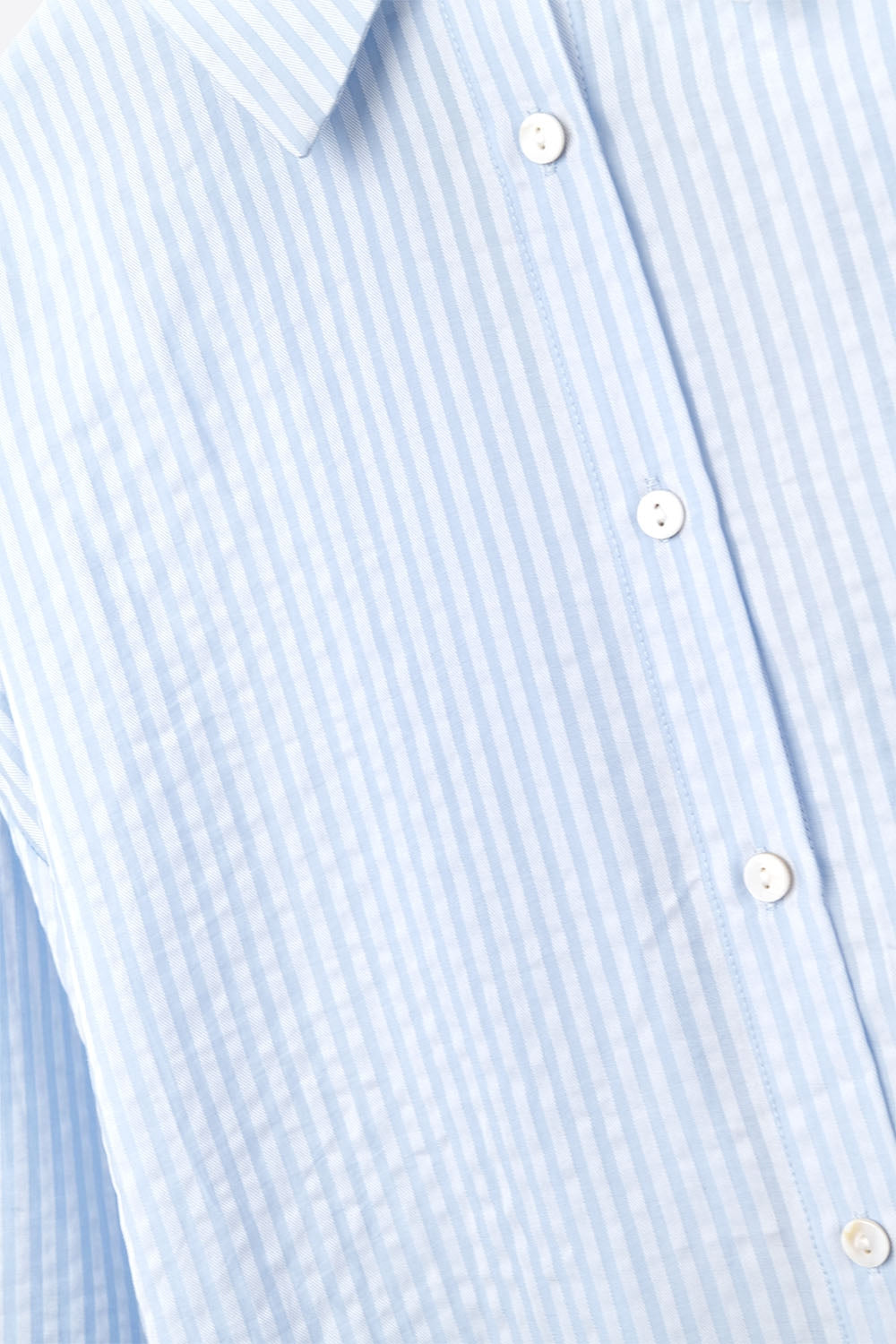 oversized baby blue shirt with bow in the back