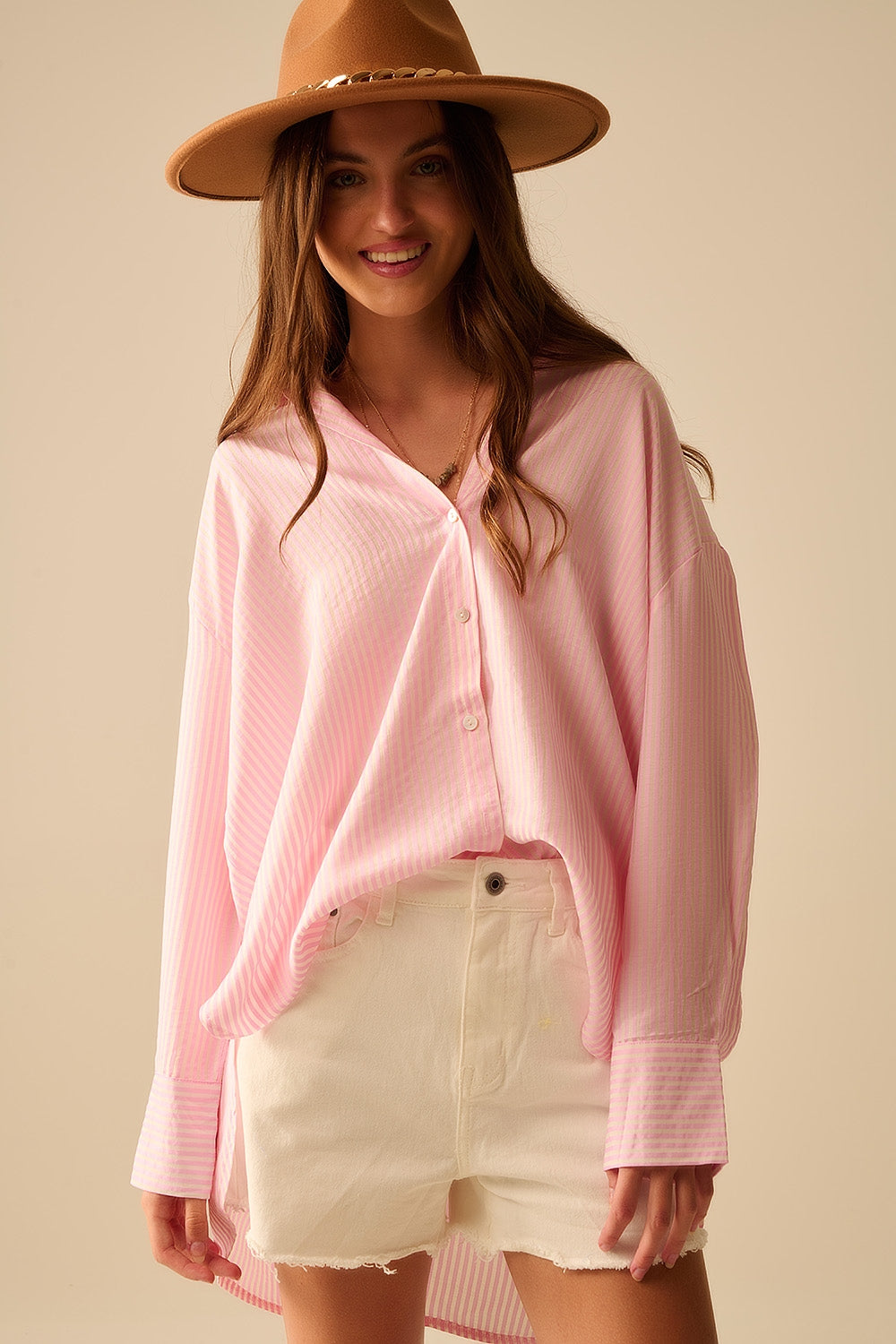 oversized baby pink shirt with bow in the back