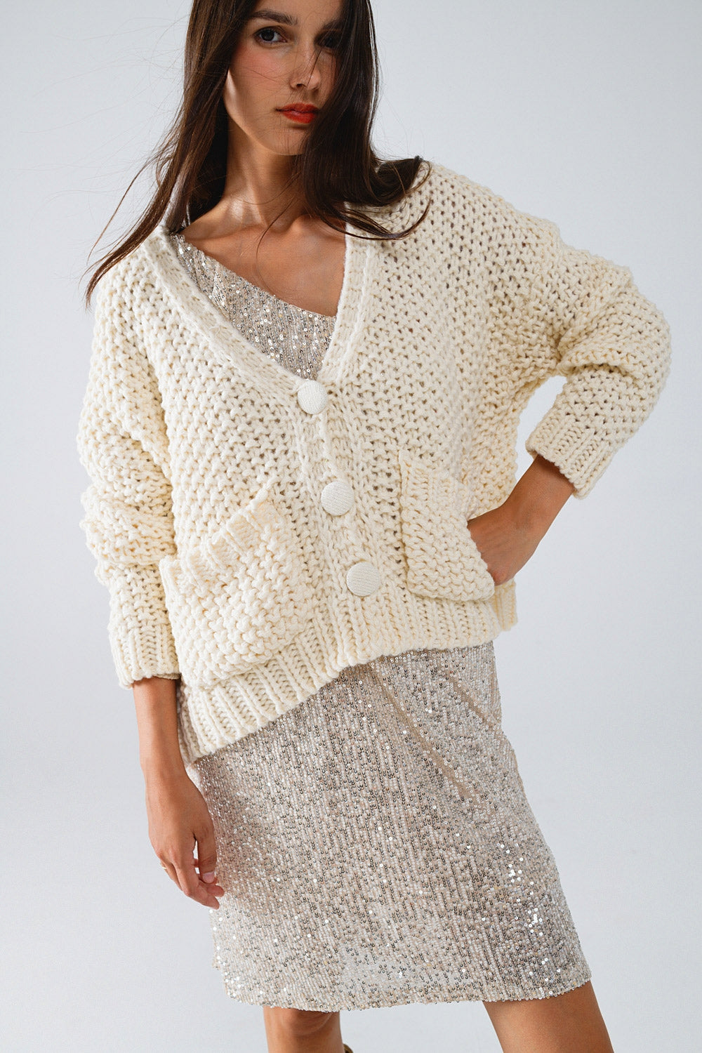 Oversized beige chunky knit jacket with pockets