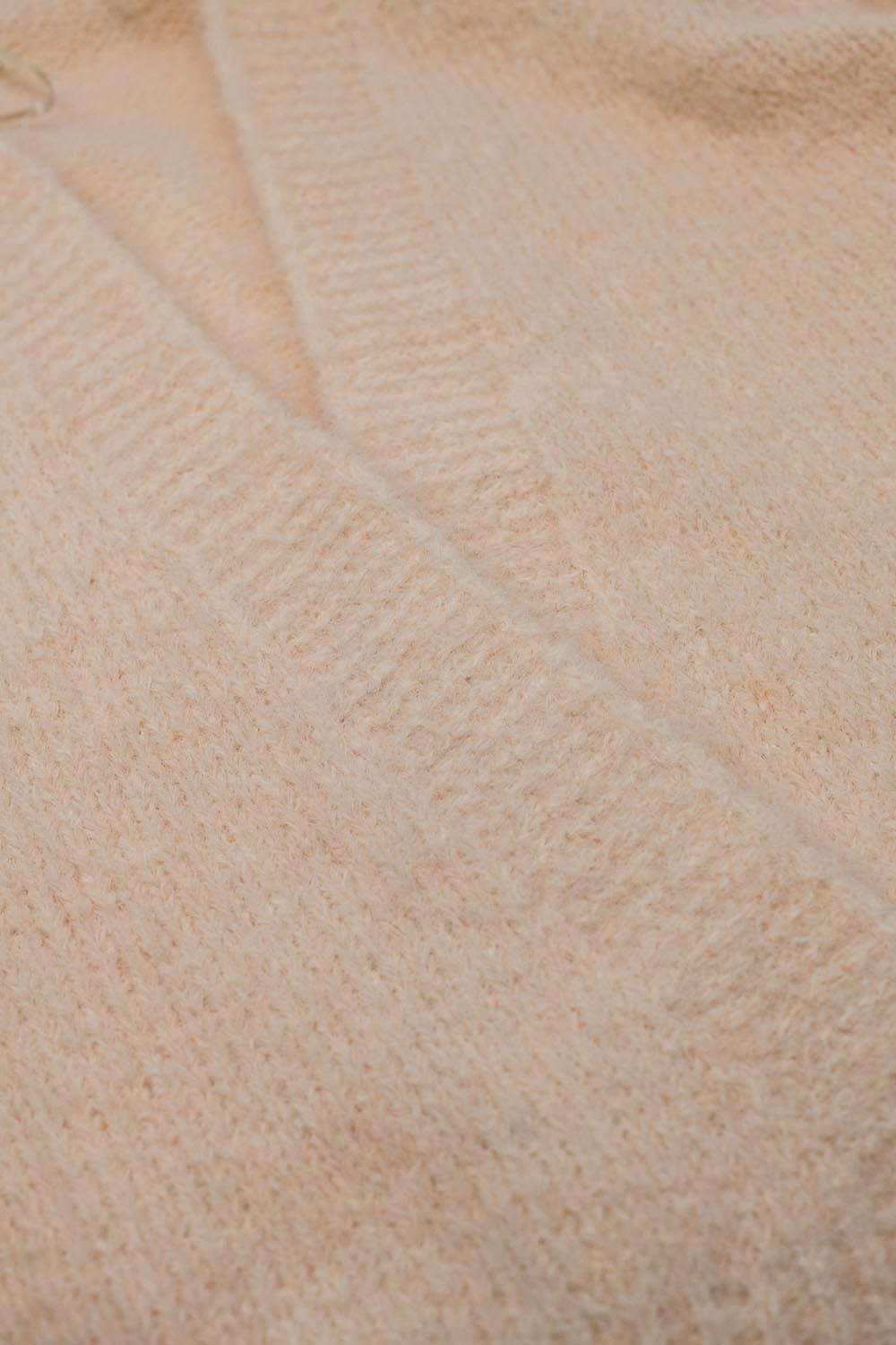 Oversized fluffy knit open cardigan in white with rib at them and cuffs