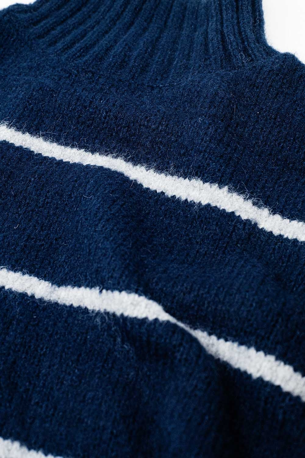 Oversized marineblauwe trui met witte strepen