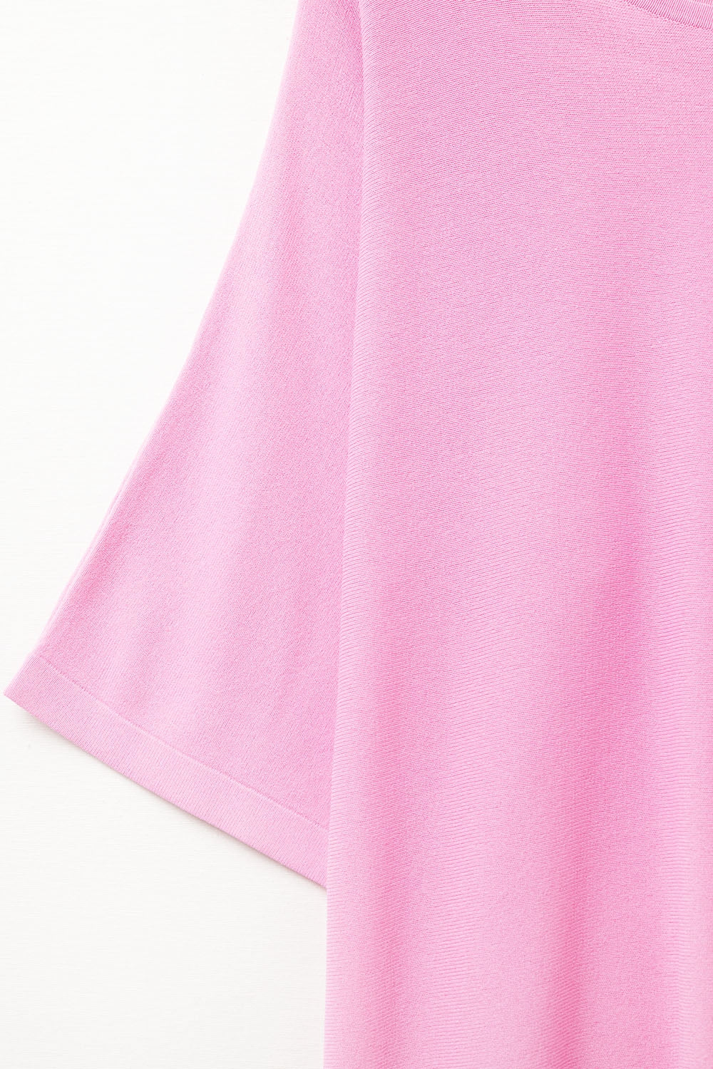 Oversized trui in fuchsia met mouwen tot aan de elleboog