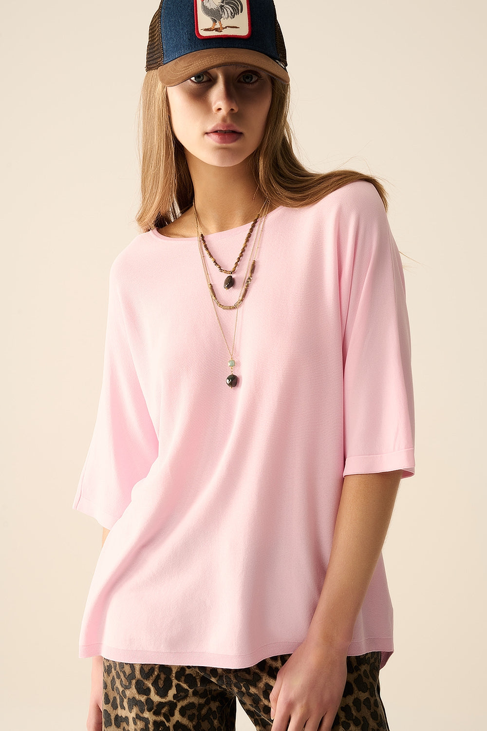Camisola oversized rosa com mangas até ao cotovelo
