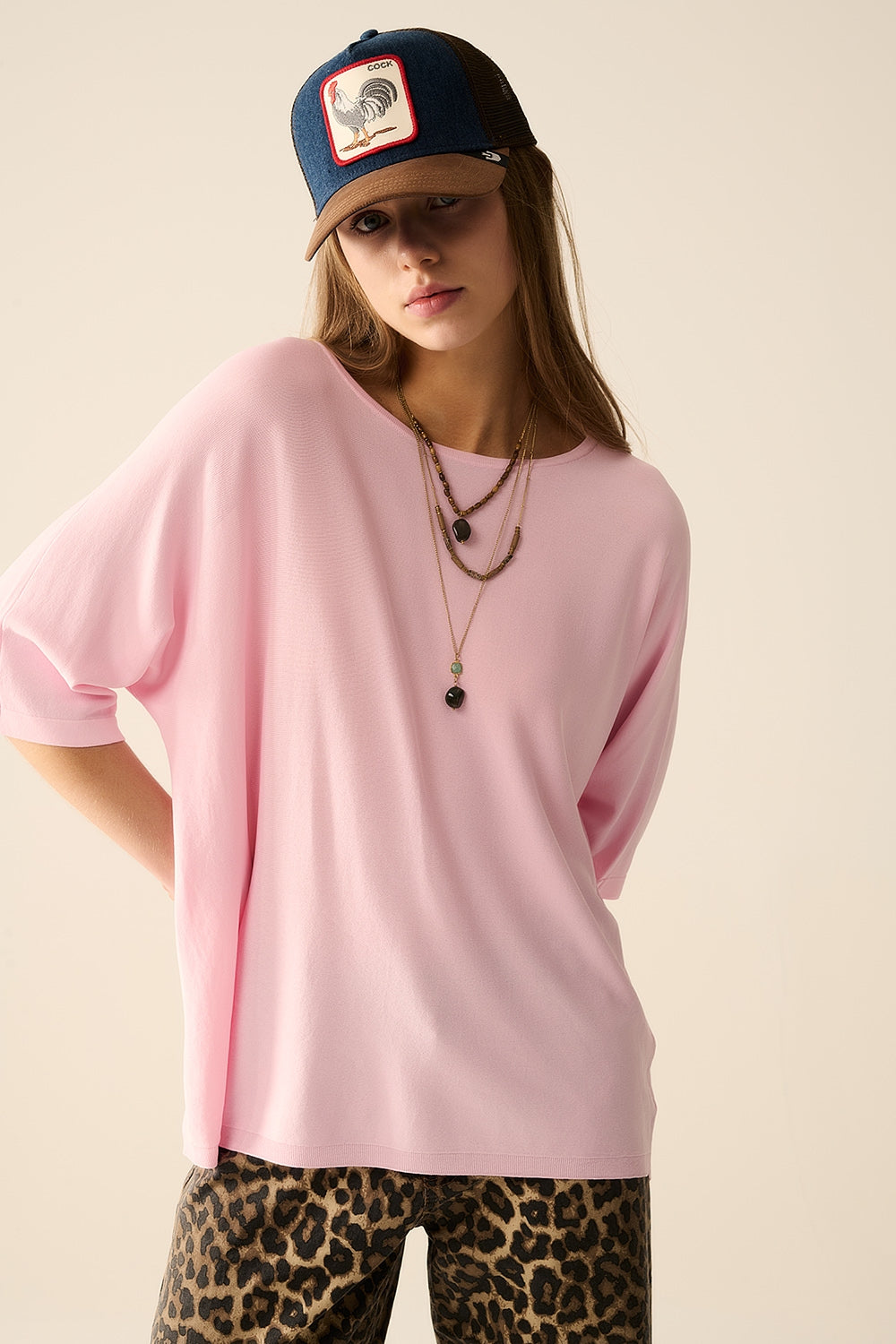 Camisola oversized rosa com mangas até ao cotovelo