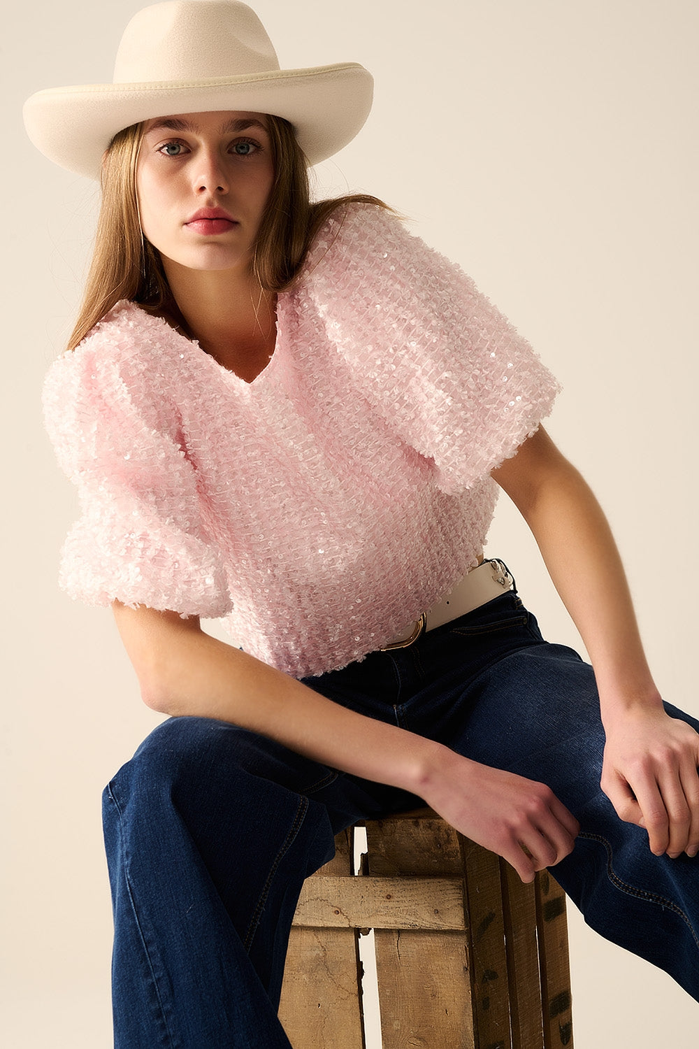 Pink top with sequin detail and balloon sleeves