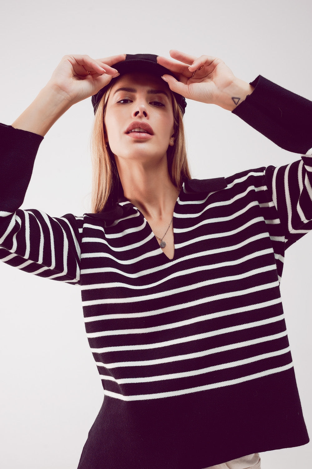Polo neck sweater in black stripe