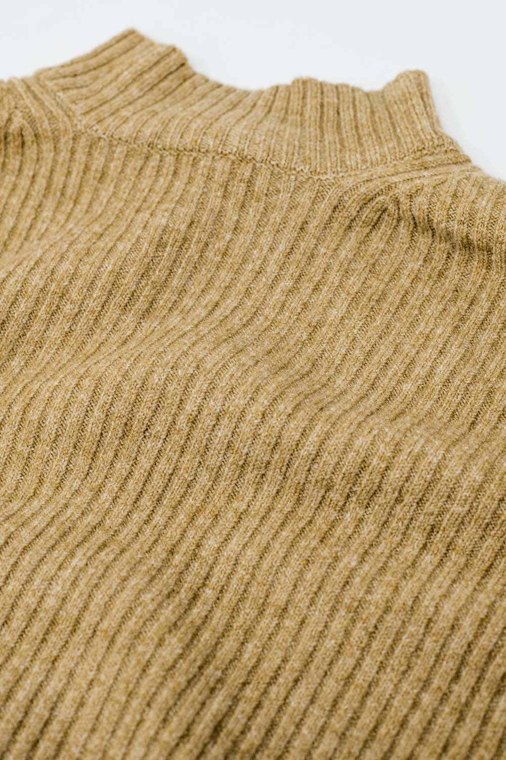relaxed beige ribbed high neck sweater